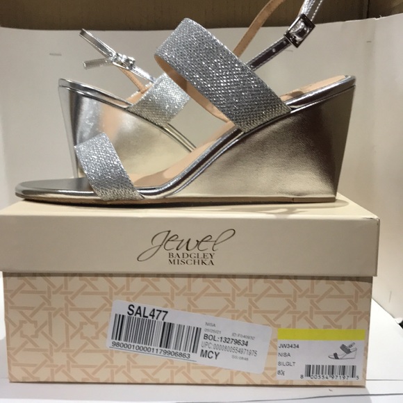 Badgley Mischka Shoes - Brand new use as floor sample Badgley Mischka platform Silver Glittery 8.5
